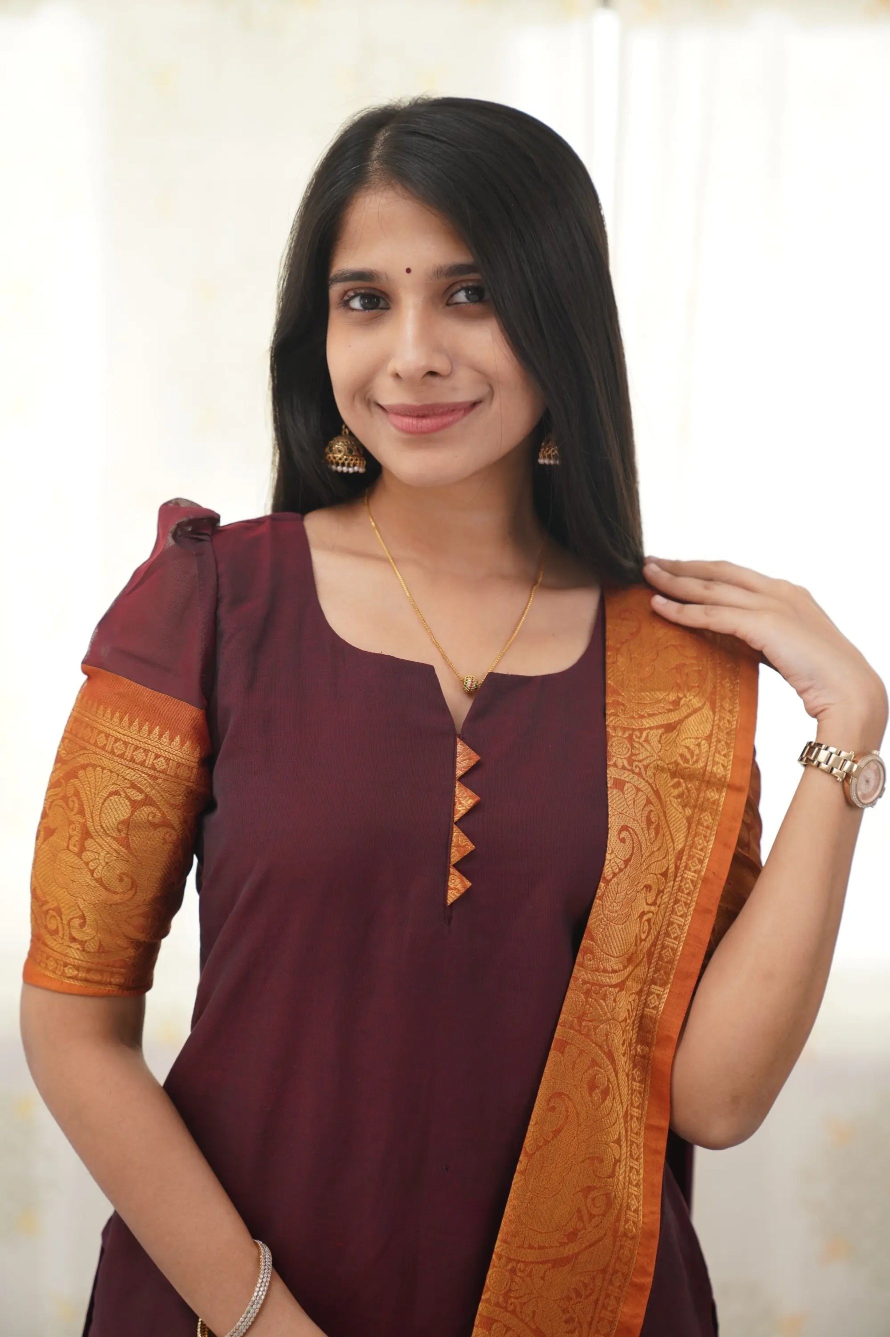 Maroon Cotton Kurti with Bold Orange Border – Classic Charm Meets Contemporary Style
