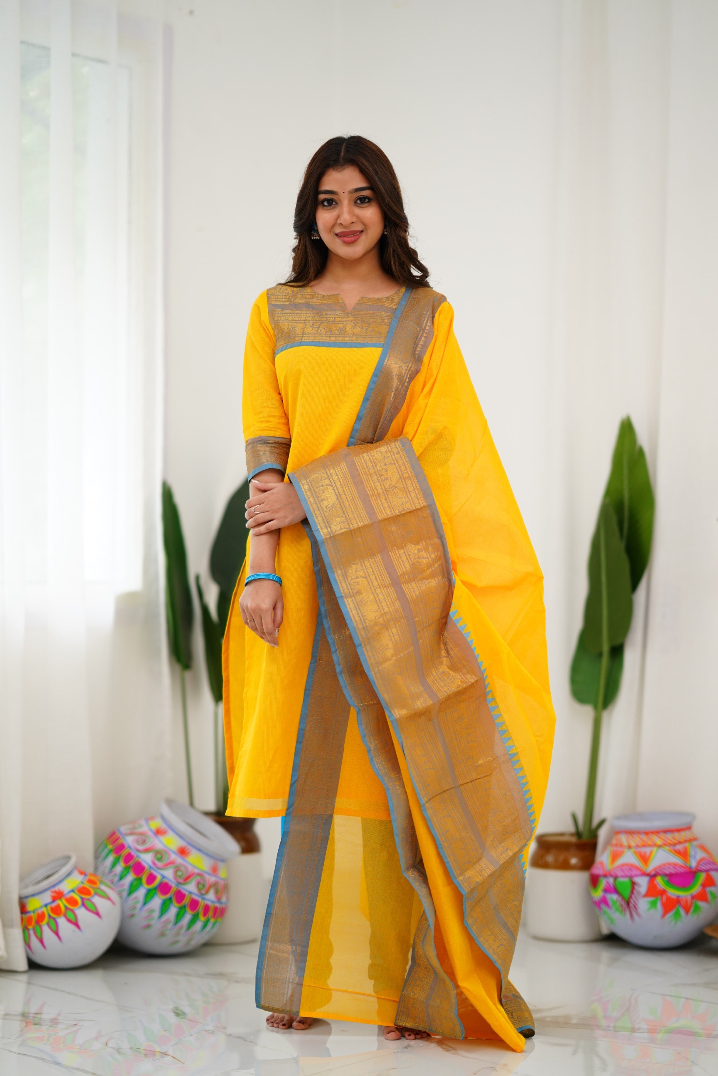 Sunny Yellow Cotton Kurta Set with Blue Border – Bold, Beautiful, and Timeless