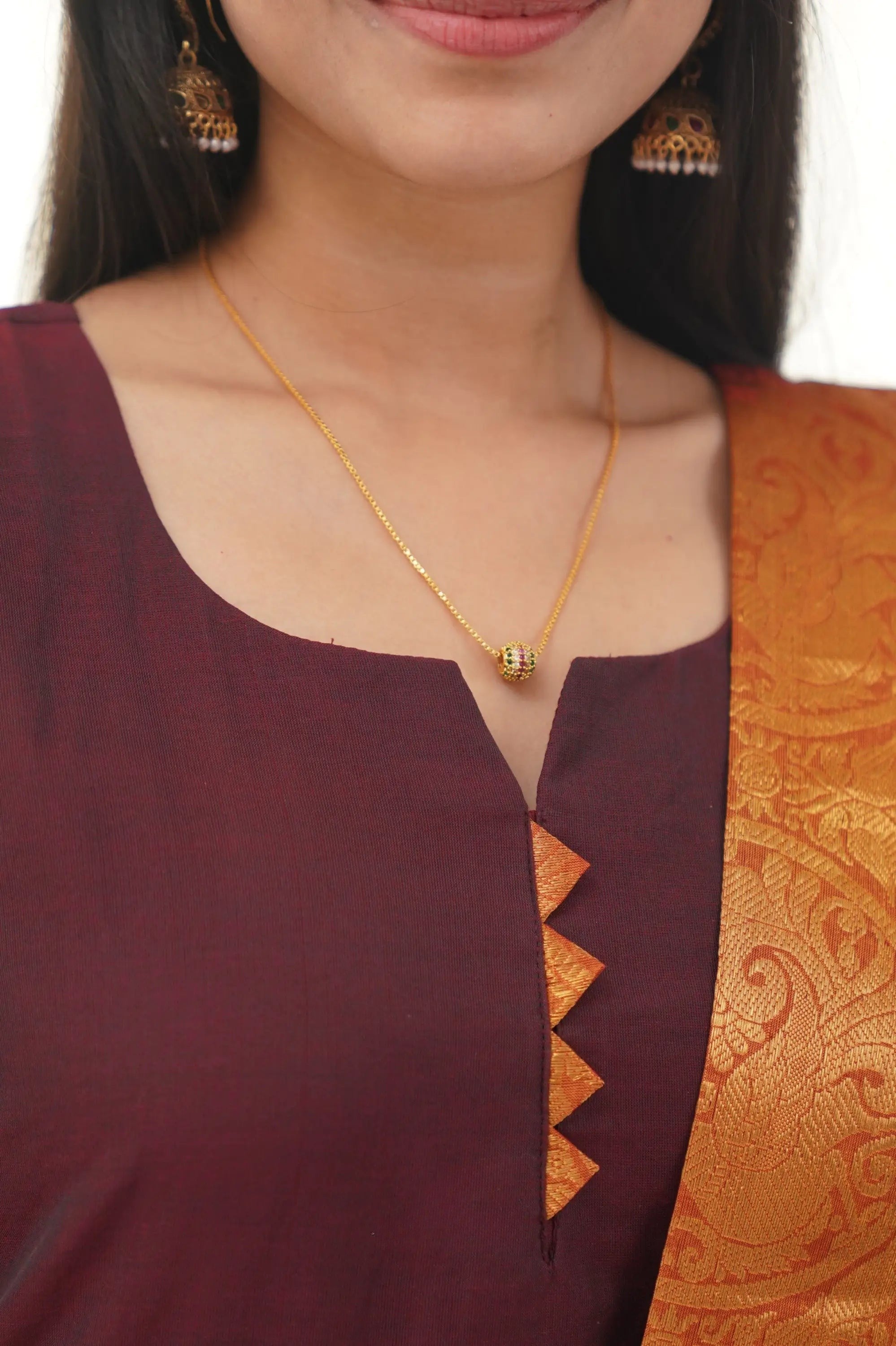 Maroon Cotton Kurti with Bold Orange Border – Classic Charm Meets Contemporary Style